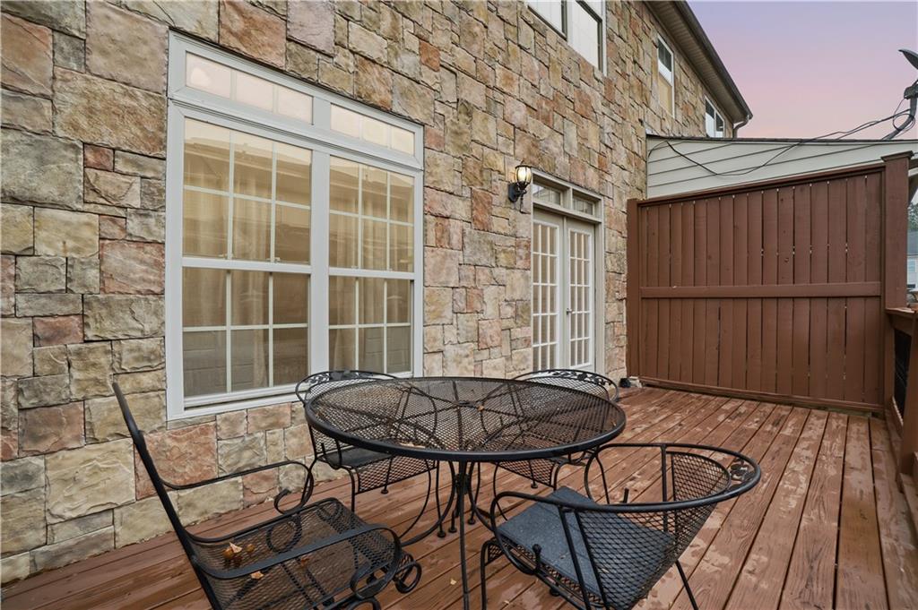 4414 George David Way Powder Springs, GA 30127 - Photo 11 of 29 a view of a chairs and table in the patio