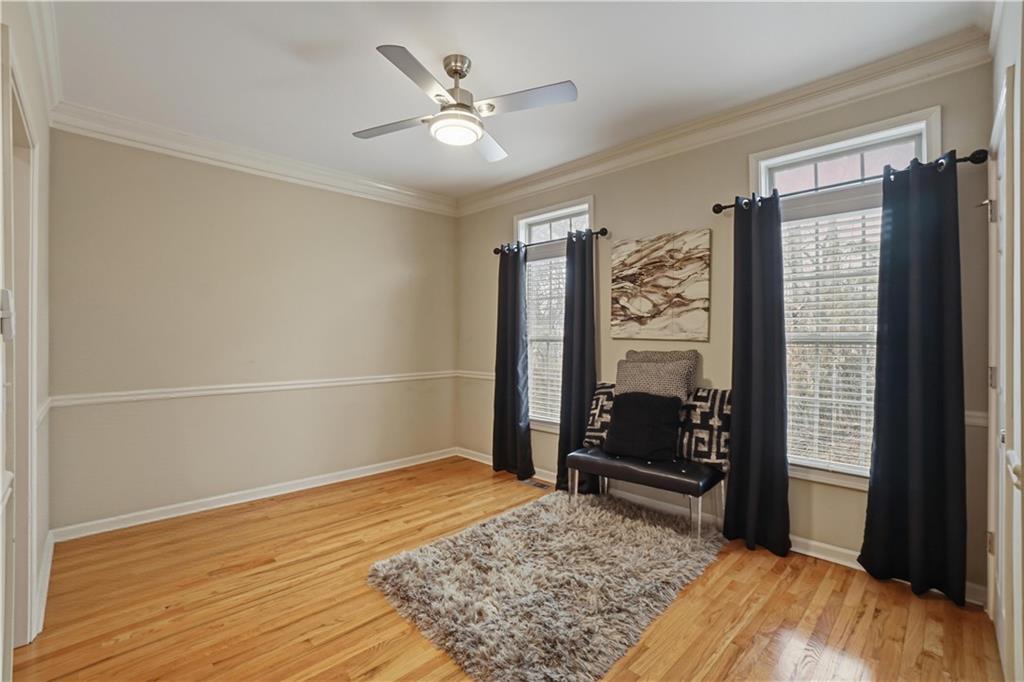 4414 George David Way Powder Springs, GA 30127 - Photo 12 of 29 a bedroom with a bed and a window