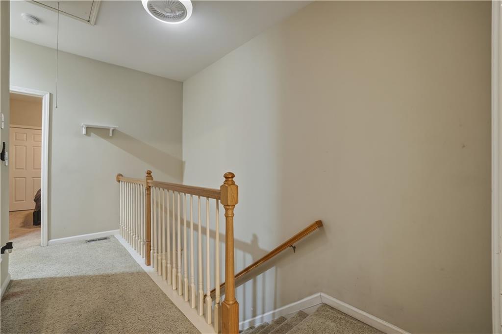 4414 George David Way Powder Springs, GA 30127 - Photo 15 of 29 a view of a hallway with staircase