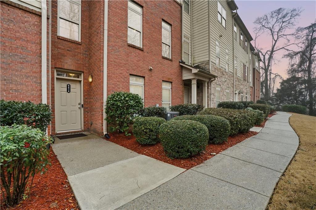 4414 George David Way Powder Springs, GA 30127 - Photo 2 of 29 a view of a building with potted plants