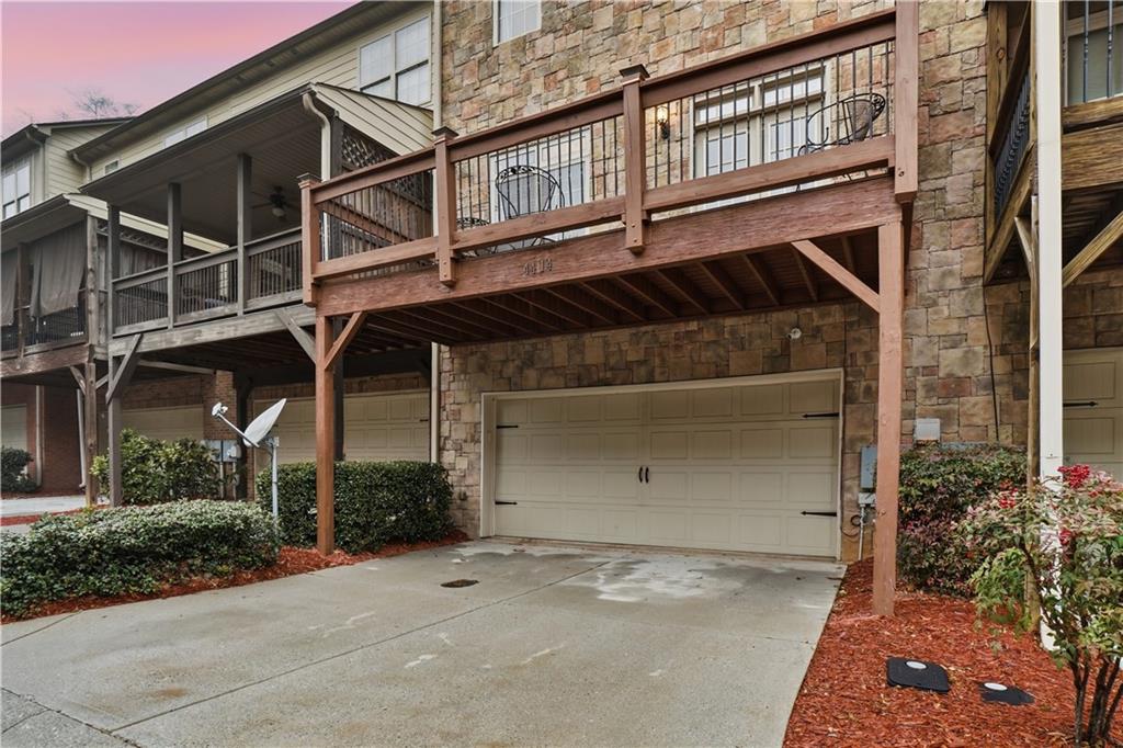 4414 George David Way Powder Springs, GA 30127 - Photo 26 of 29 front view of a house with a street