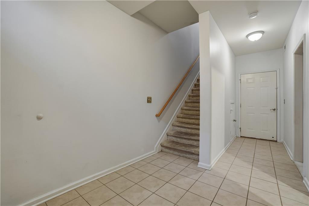4414 George David Way Powder Springs, GA 30127 - Photo 3 of 29 a view of an entryway with stairs