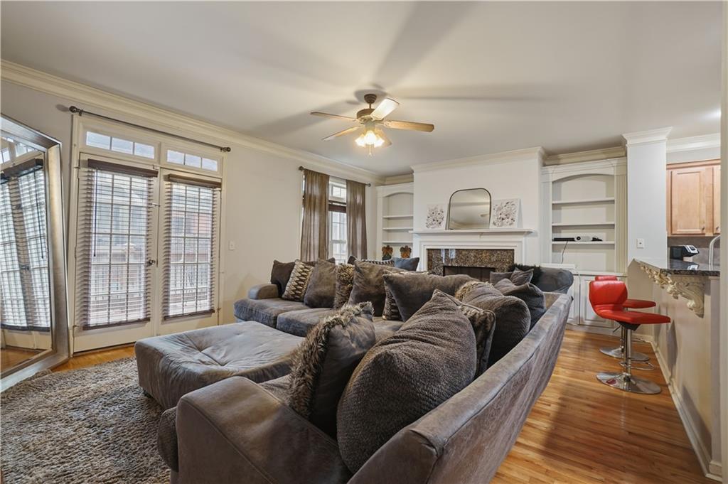 4414 George David Way Powder Springs, GA 30127 - Photo 8 of 29 a living room with furniture and a large window