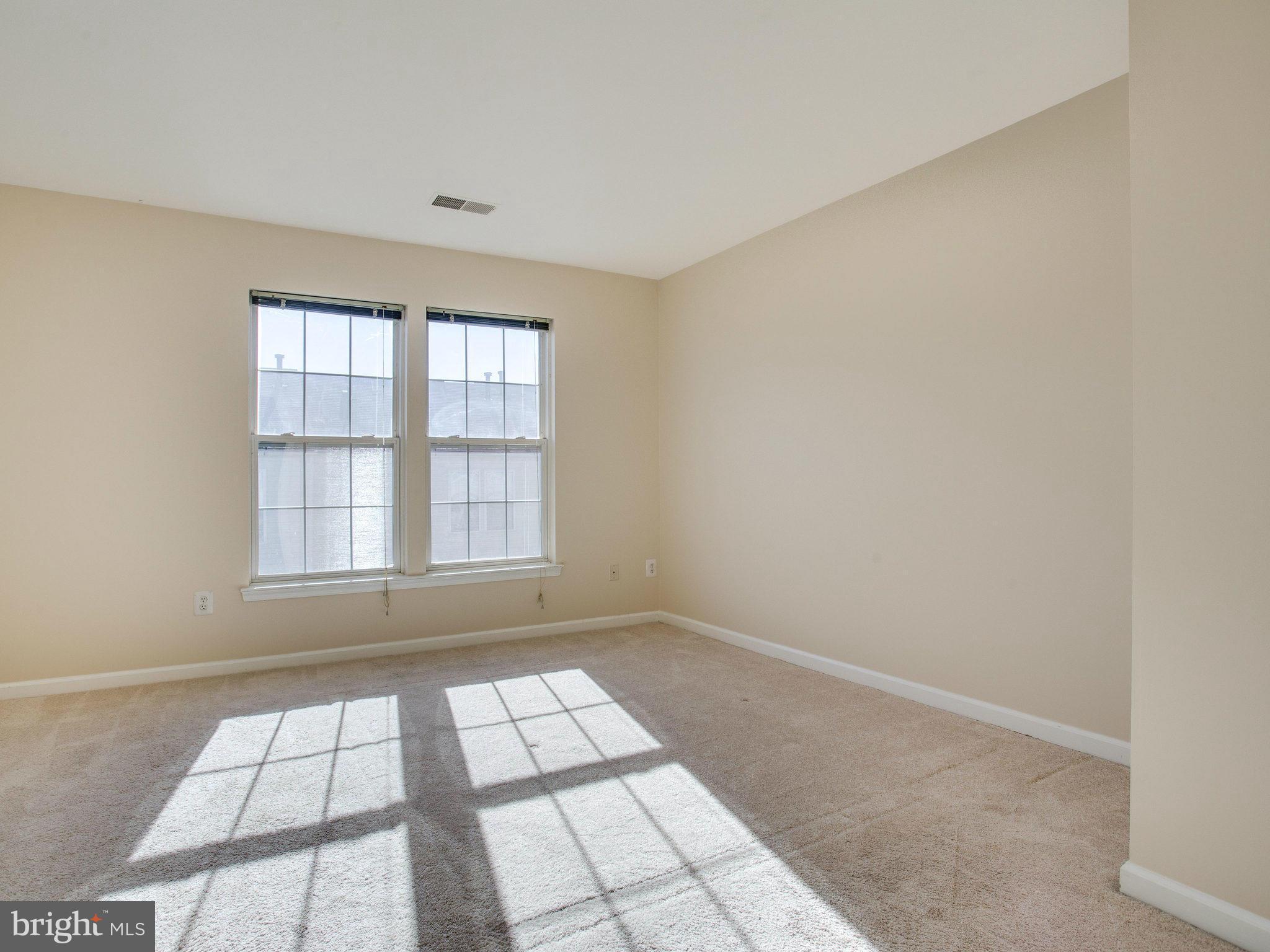 6395 Stagg Court Springfield, VA 22150 - Photo 15 of 30 a view of empty room with windows
