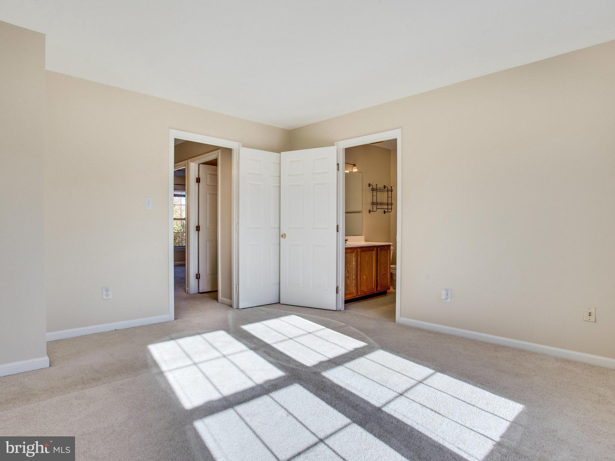 6395 Stagg Court Springfield, VA 22150 - Photo 16 of 30 a view of room with window and stairs