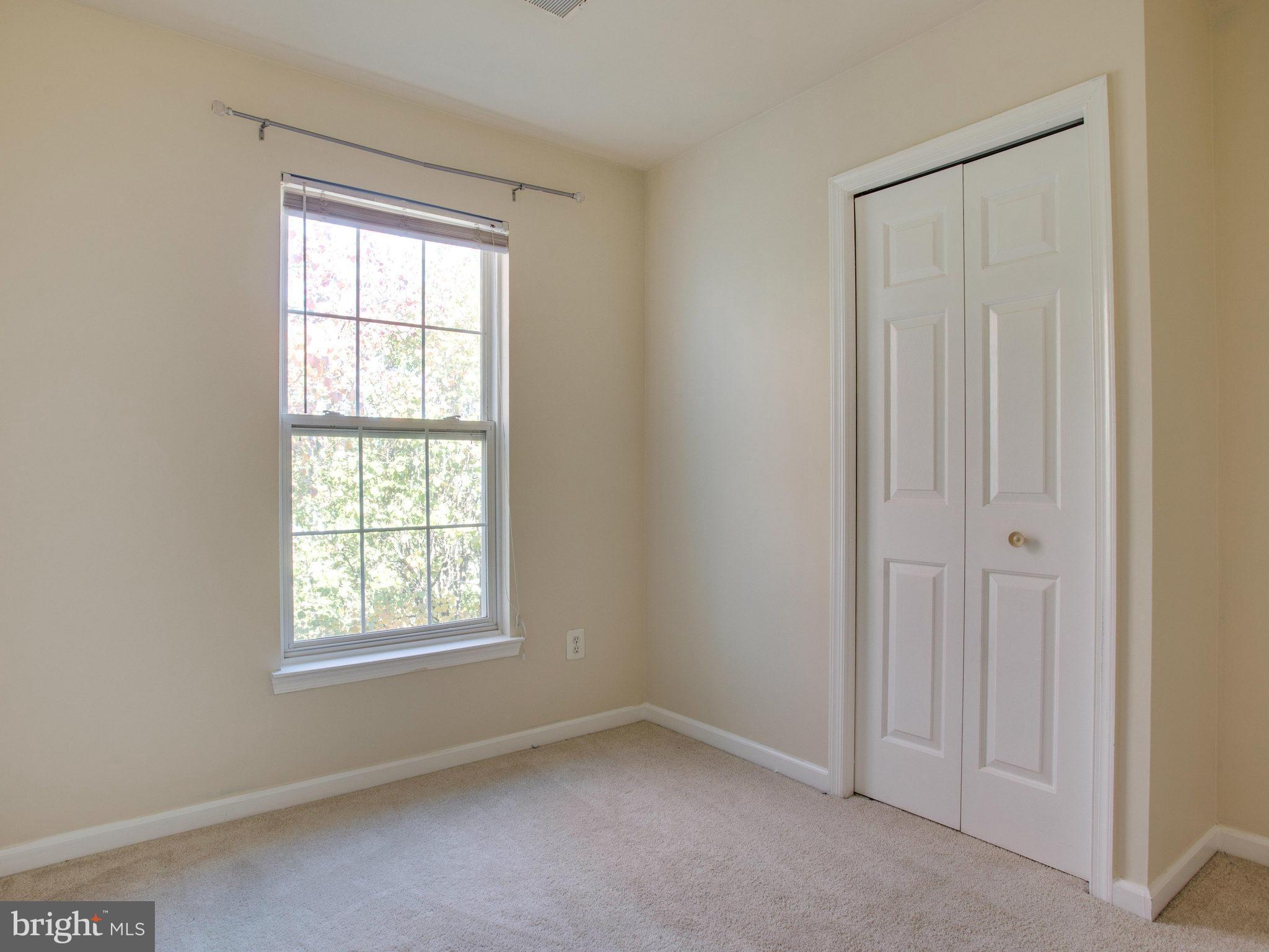 6395 Stagg Court Springfield, VA 22150 - Photo 19 of 30 an empty room with windows and closet