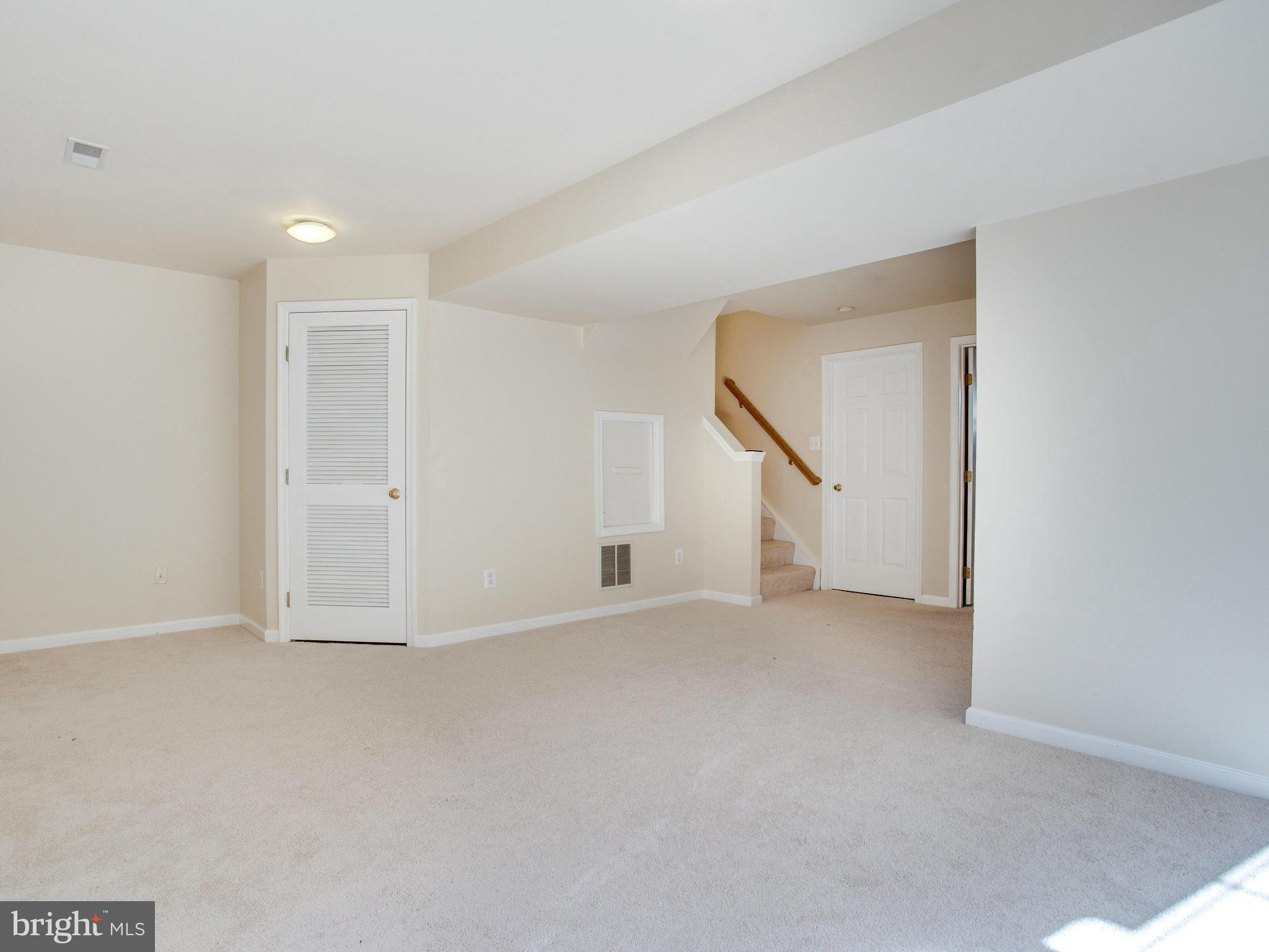 6395 Stagg Court Springfield, VA 22150 - Photo 23 of 30 a view of an empty room with stairs