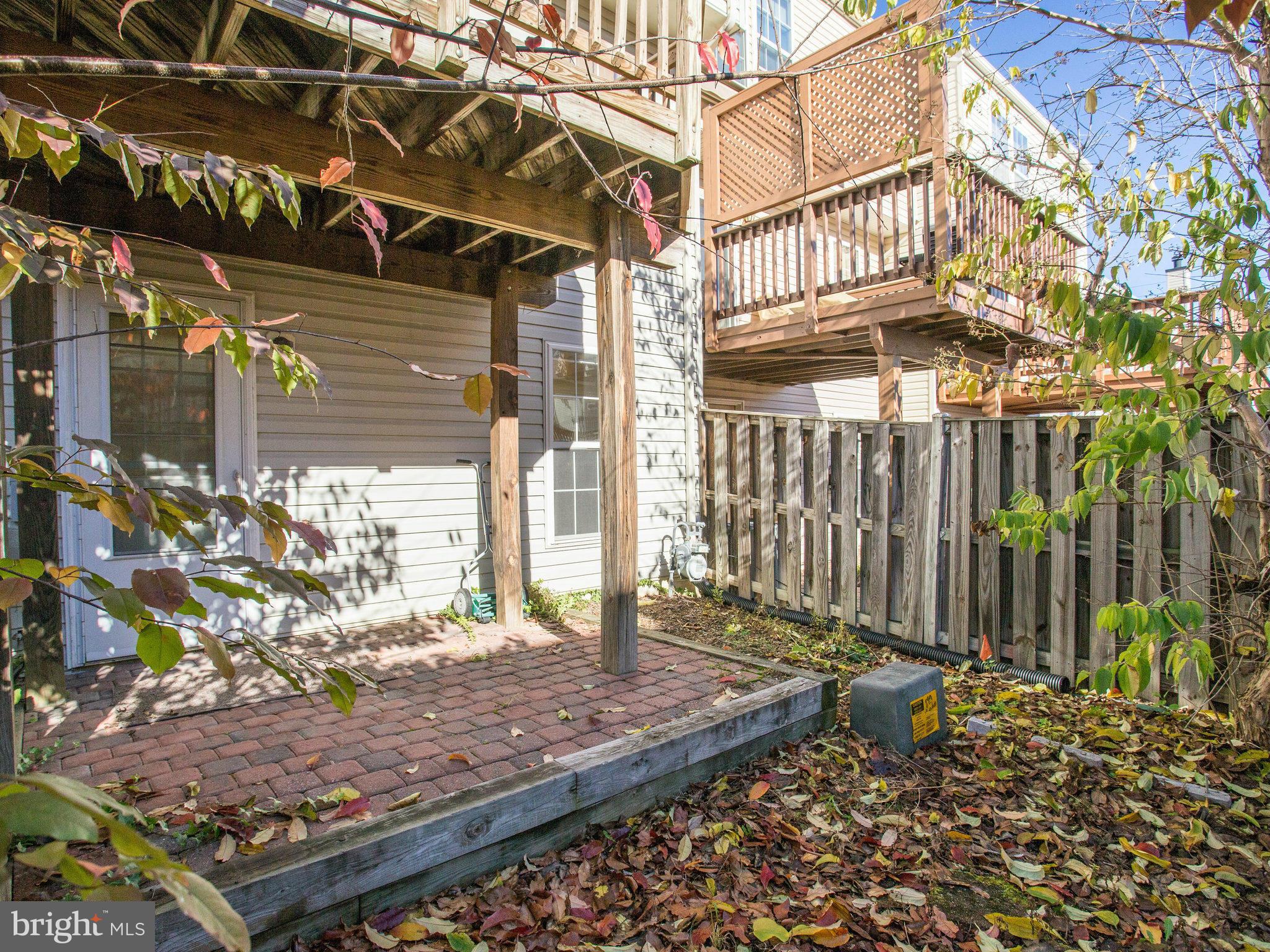 6395 Stagg Court Springfield, VA 22150 - Photo 27 of 30 a view of a pathway of a house with a wooden deck