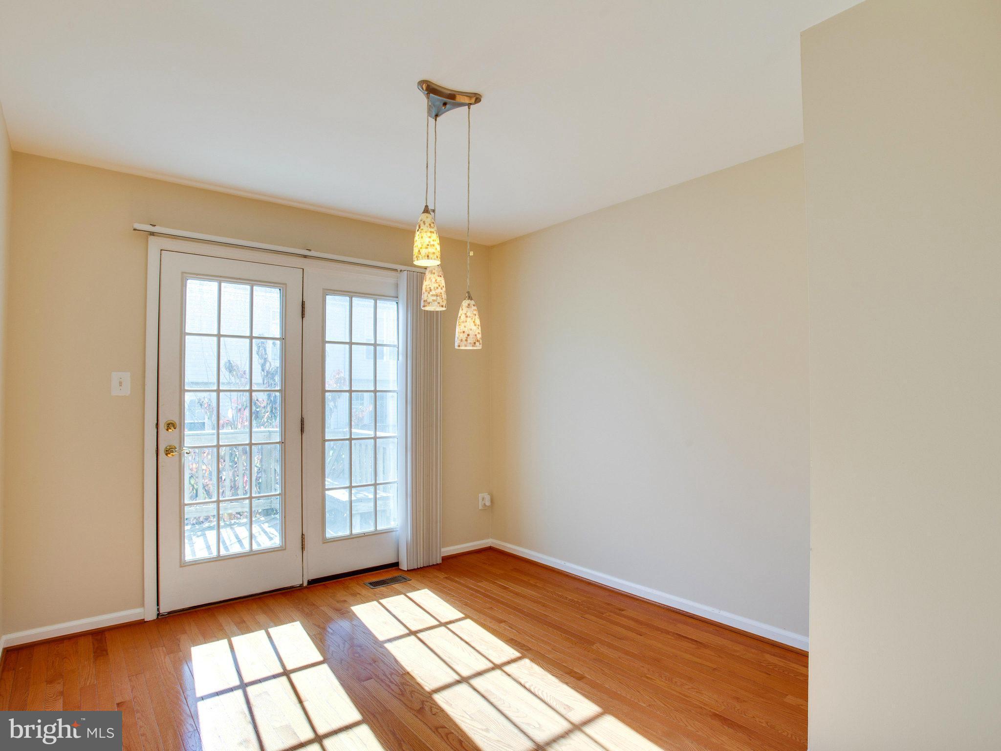 6395 Stagg Court Springfield, VA 22150 - Photo 7 of 30 a view of an empty room and window