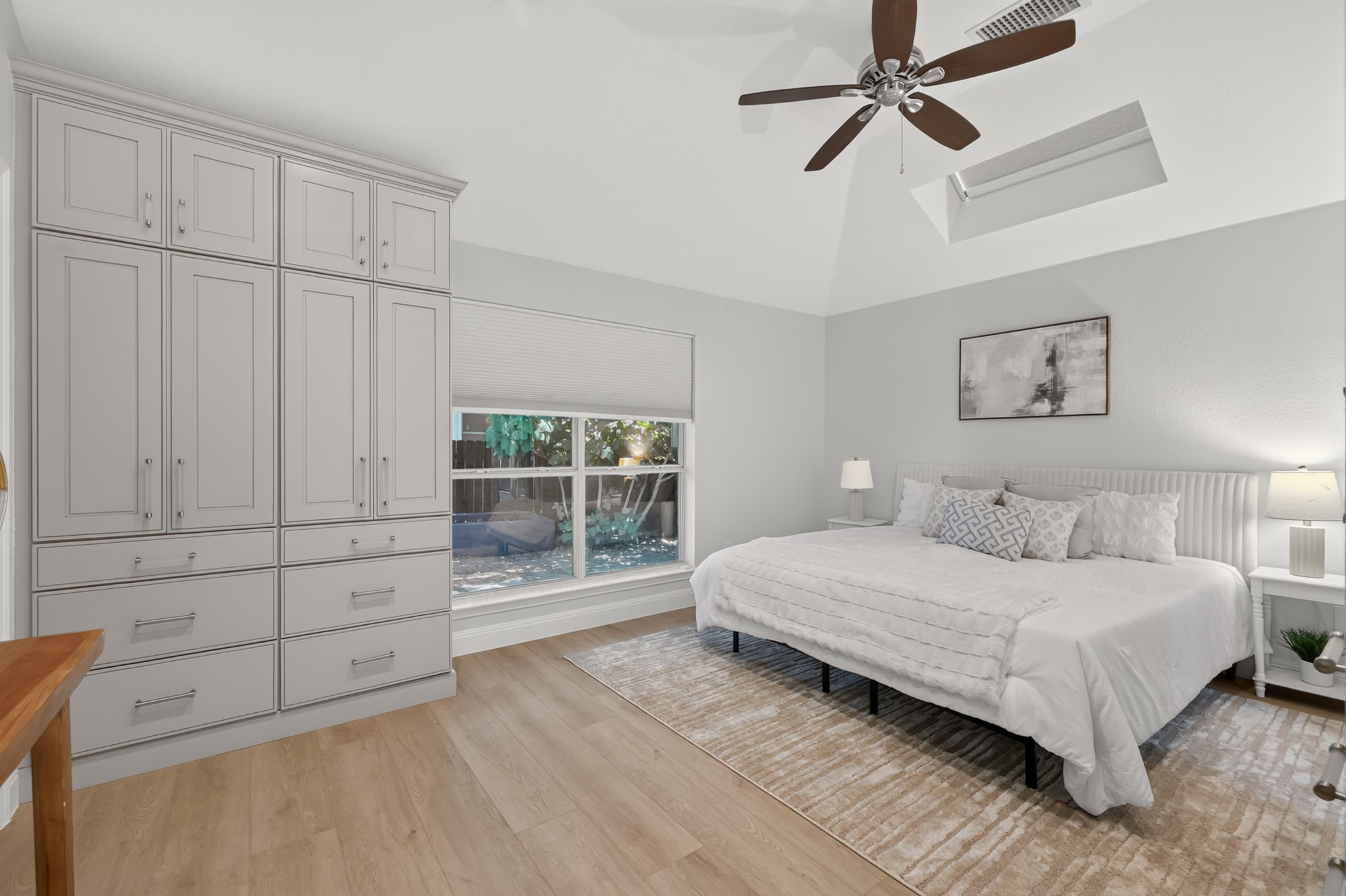 13536 Anarosa Loop Austin, TX 78727 - Photo 18 of 31 High ceilings give the main bedroom a sense of openness, offering a peaceful setting to rest and recharge at the end of the day