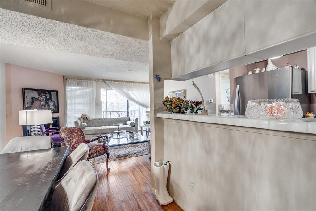 11470 Audelia Road, Unit 351 Dallas, TX 75243 - Photo 14 of 25 a living room with furniture and wooden floor