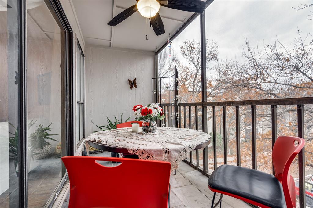 11470 Audelia Road, Unit 351 Dallas, TX 75243 - Photo 24 of 25 a view of a dining room with furniture window and wooden floor