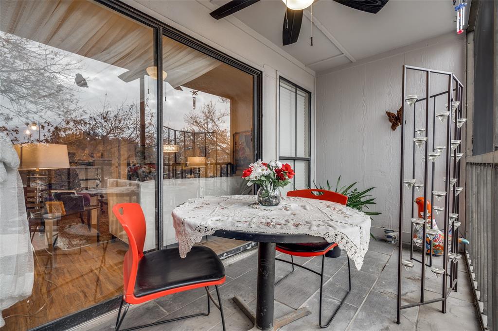 11470 Audelia Road, Unit 351 Dallas, TX 75243 - Photo 25 of 25 a view of a dining table and chairs in the patio