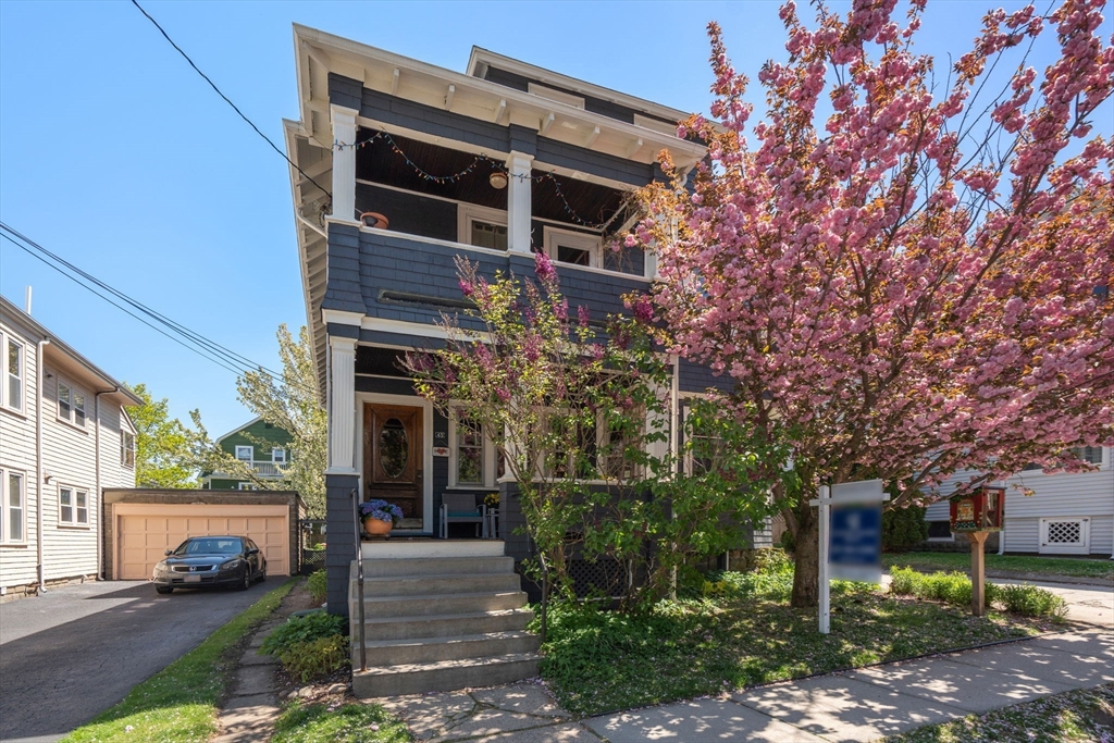 45 Springfield Street, Unit 1 Belmont, MA 02478 - Photo 26 of 27 a front view of a building with garden