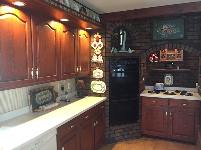 1619 Riverside Drive McHenry, IL 60050 - Photo 4 of 25 a kitchen with stainless steel appliances granite countertop a refrigerator and a stove