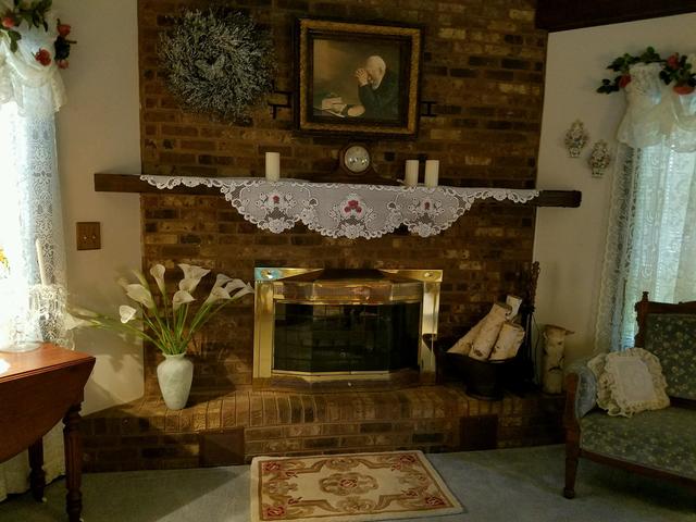 1619 Riverside Drive McHenry, IL 60050 - Photo 8 of 25 a living room with furniture and a fireplace