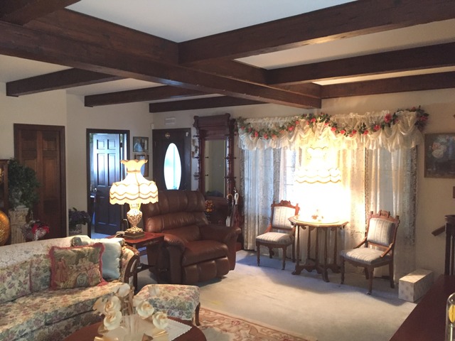 1619 Riverside Drive McHenry, IL 60050 - Photo 9 of 25 a living room with furniture and a large window