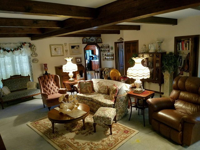 1619 Riverside Drive McHenry, IL 60050 - Photo 10 of 25 a living room with furniture and a chandelier