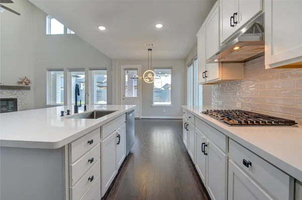 a spacious bathroom with a double vanity sink mirror and