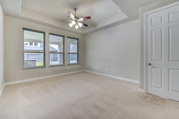 a view of a yard in front of a house