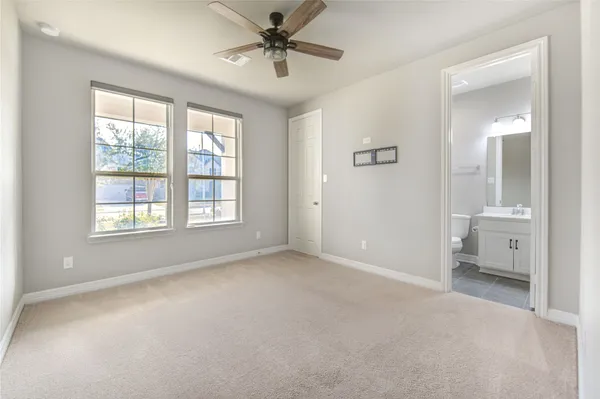 a kitchen with stainless steel appliances a sink stove and cabinets