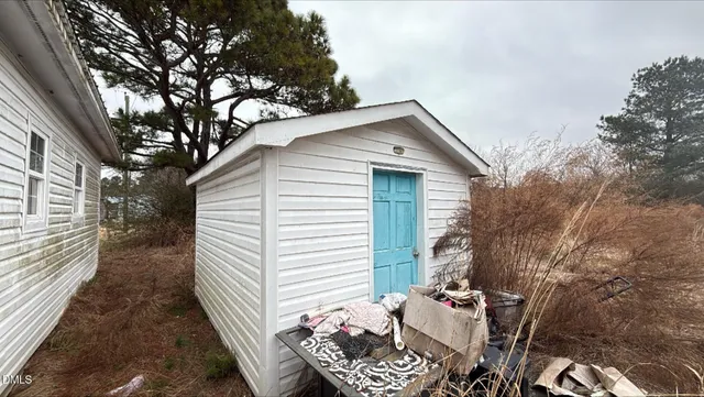 a backyard of a house with seating space