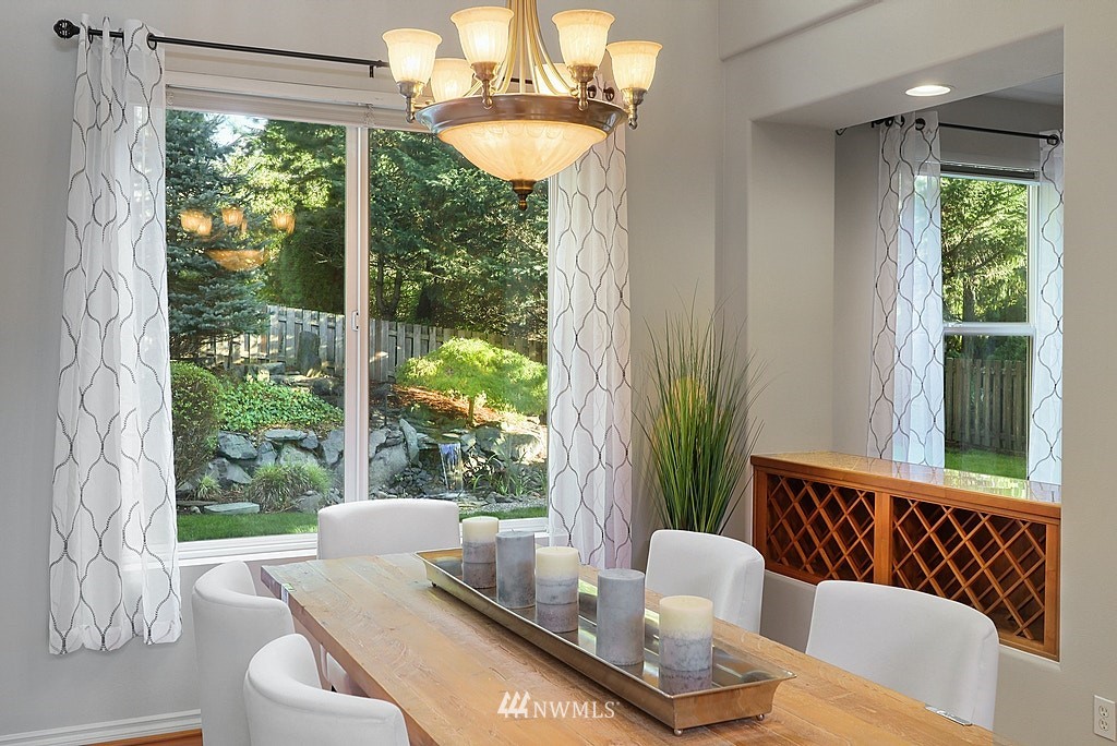 27714 Maple Ridge Way Southeast Maple Valley, WA 98038 - Photo 11 of 38 a living room with furniture and a window