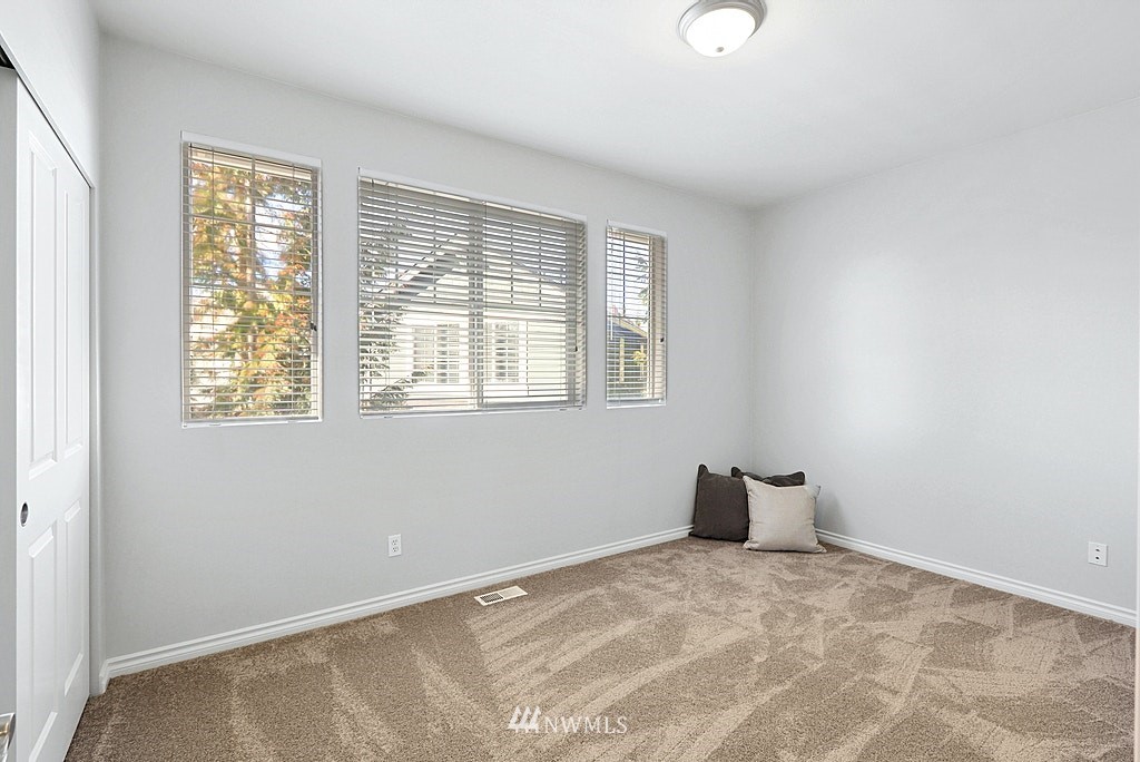27714 Maple Ridge Way Southeast Maple Valley, WA 98038 - Photo 34 of 38 a view of an empty room with a window