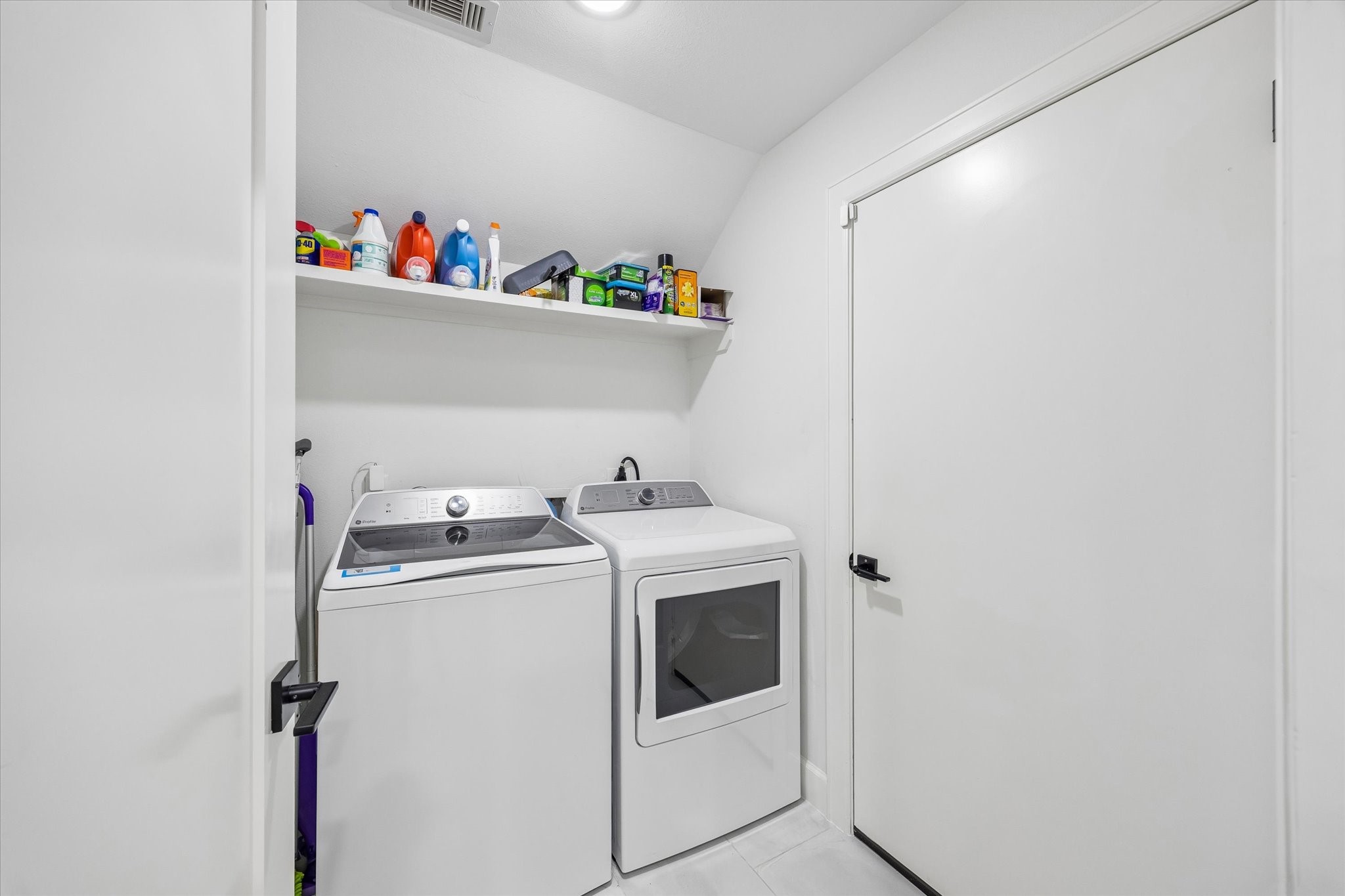 1420 Indiana Street Houston, TX 77006 - Photo 24 of 31 Wash room located inside the home. The room is bright and has a clean, minimalist design.