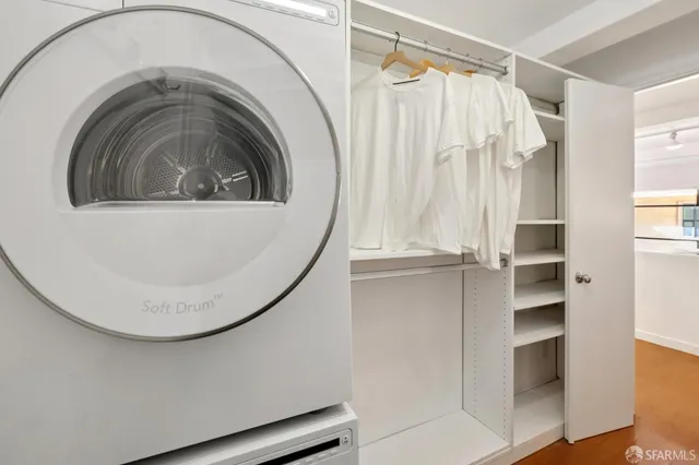a utility room with washer and dryer