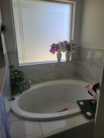 a bathroom with a bathtub