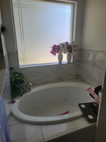 a bathroom with a bathtub