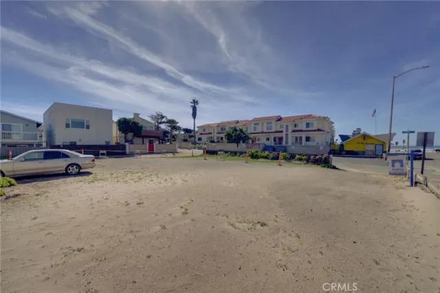 a view of a swimming pool and a yard