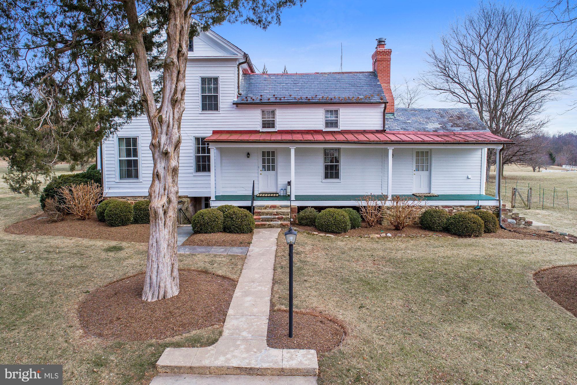 14800 Seneca Road Darnestown, MD 20874 - Photo 2 of 30 Side porch with 2 entrances to the main house.