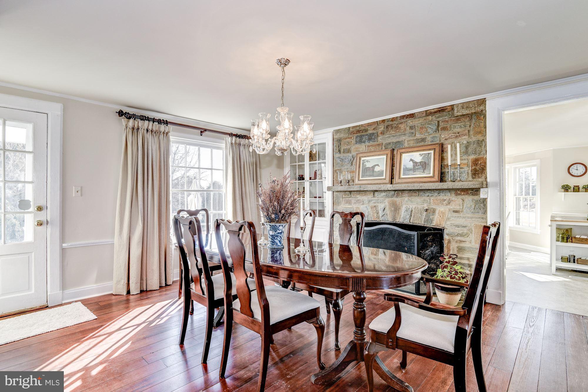 14800 Seneca Road Darnestown, MD 20874 - Photo 11 of 30 Formal Dining Room, stone fireplace.