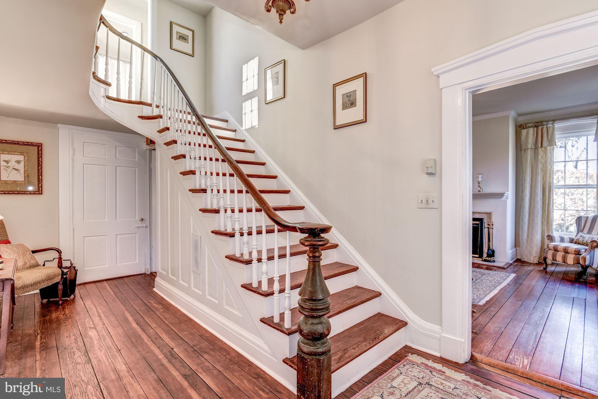 14800 Seneca Road Darnestown, MD 20874 - Photo 6 of 30 Curved staircase to the 3rd floor.
