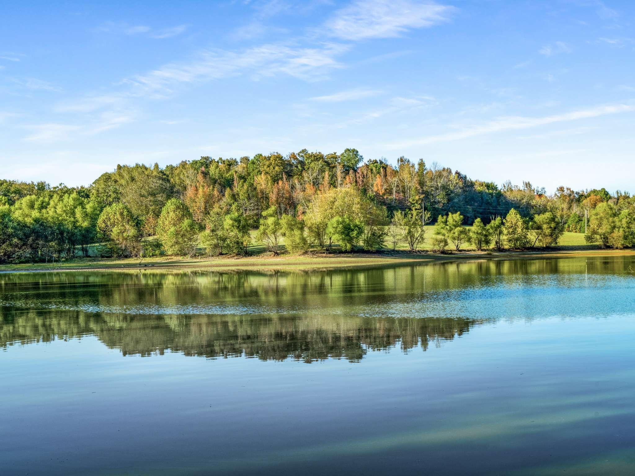 697 Johnson Branch Road Williamsport, TN 38487 - Photo 28 of 31 a view of a lake with houses in the back