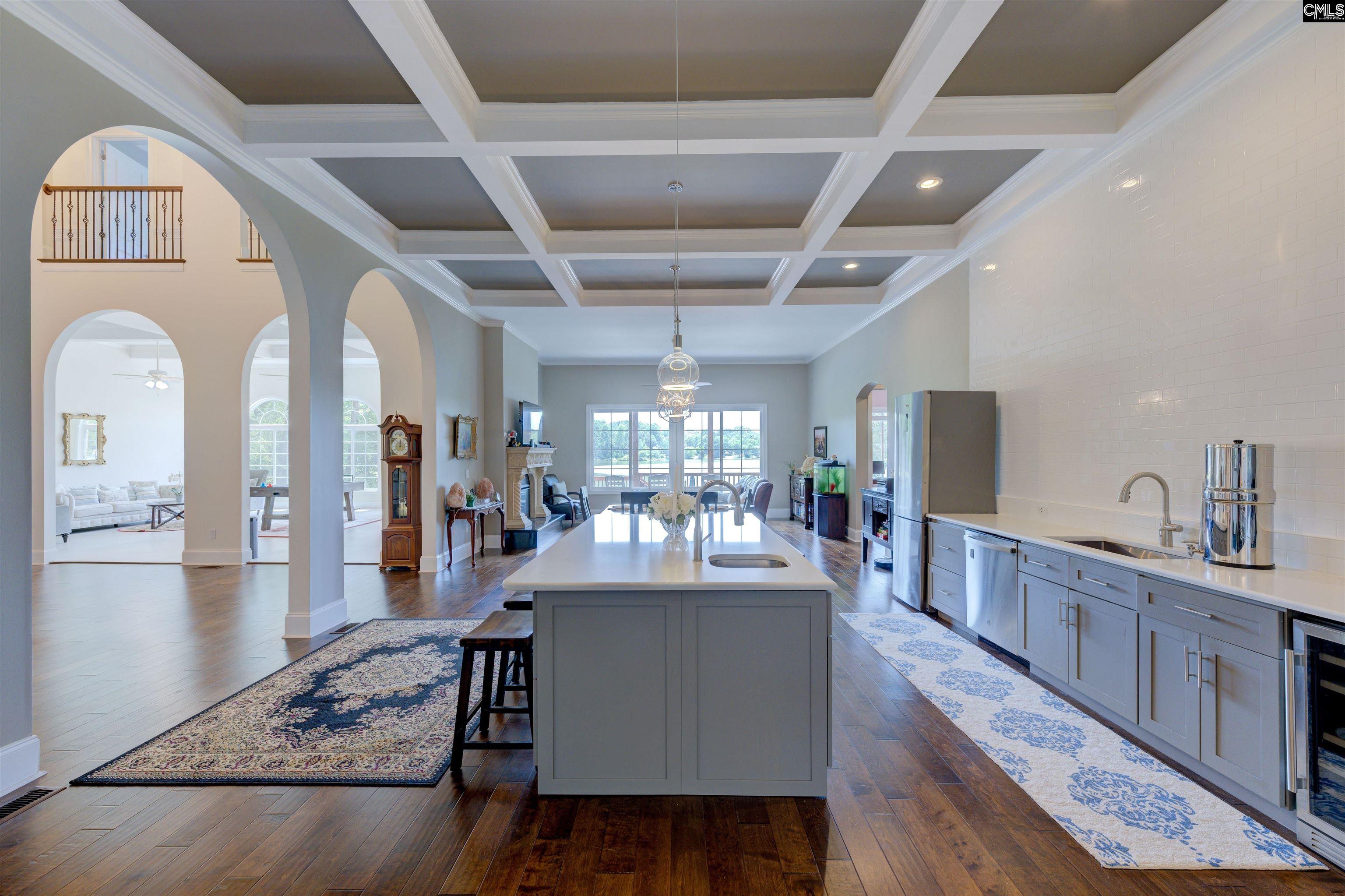 305 Northlake Road Columbia, SC 29223 - Photo 23 of 46 a dining hall with stainless steel appliances granite countertop a stove and cabinets