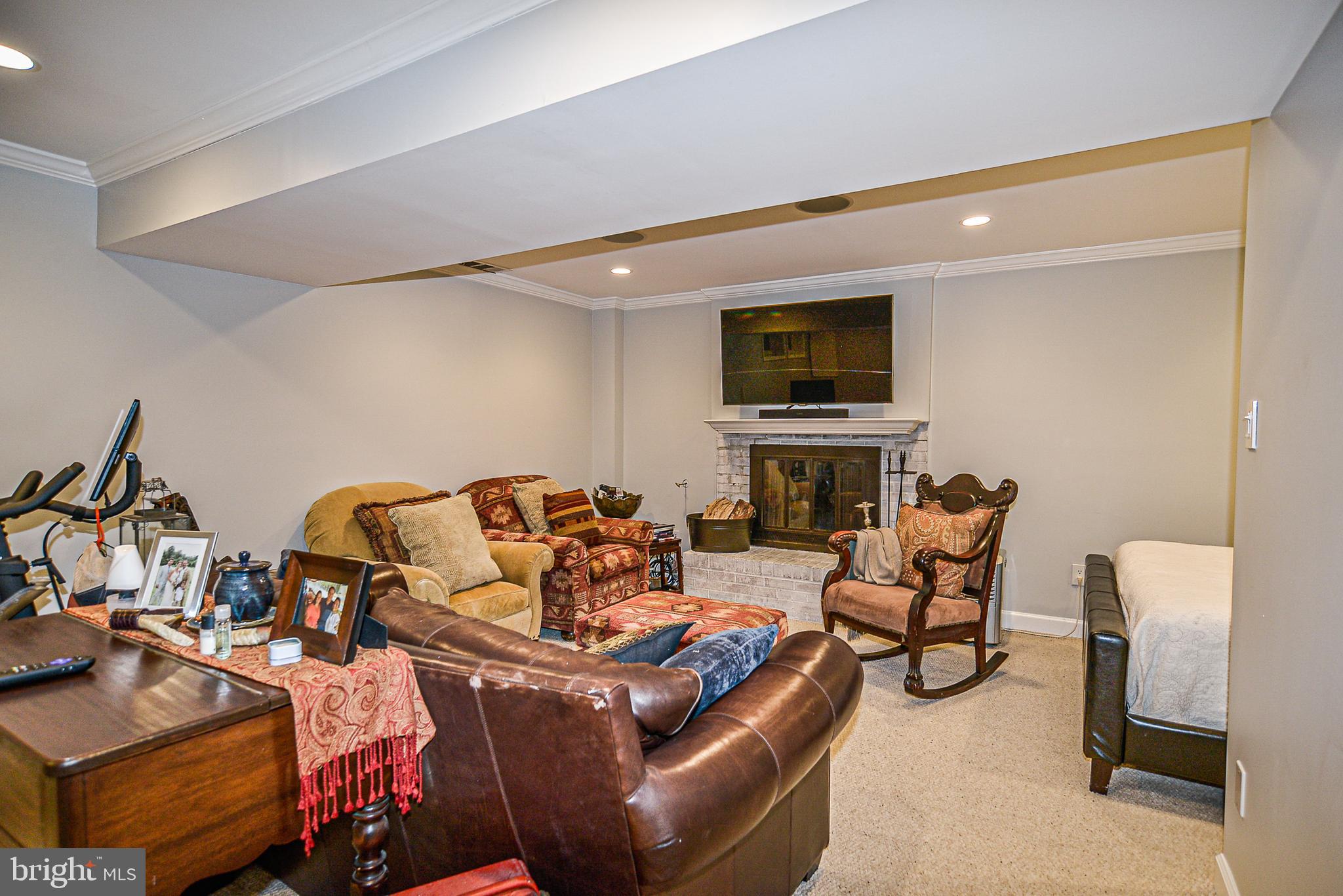 1834 Golf View Court Reston, VA 20190 - Photo 20 of 26 Lower level family room with wood / gas fireplace
