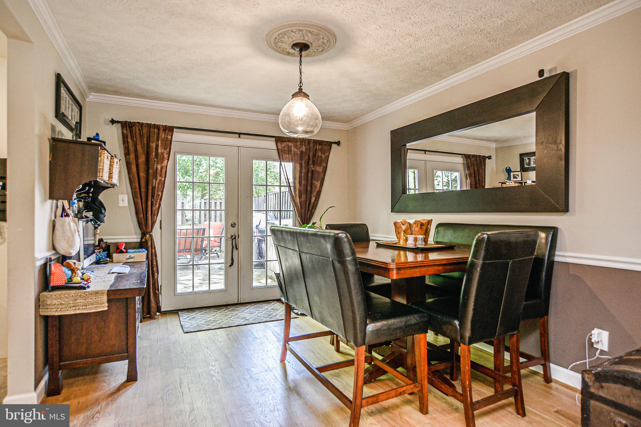 1834 Golf View Court Reston, VA 20190 - Photo 6 of 26 Dining area opens to back patio