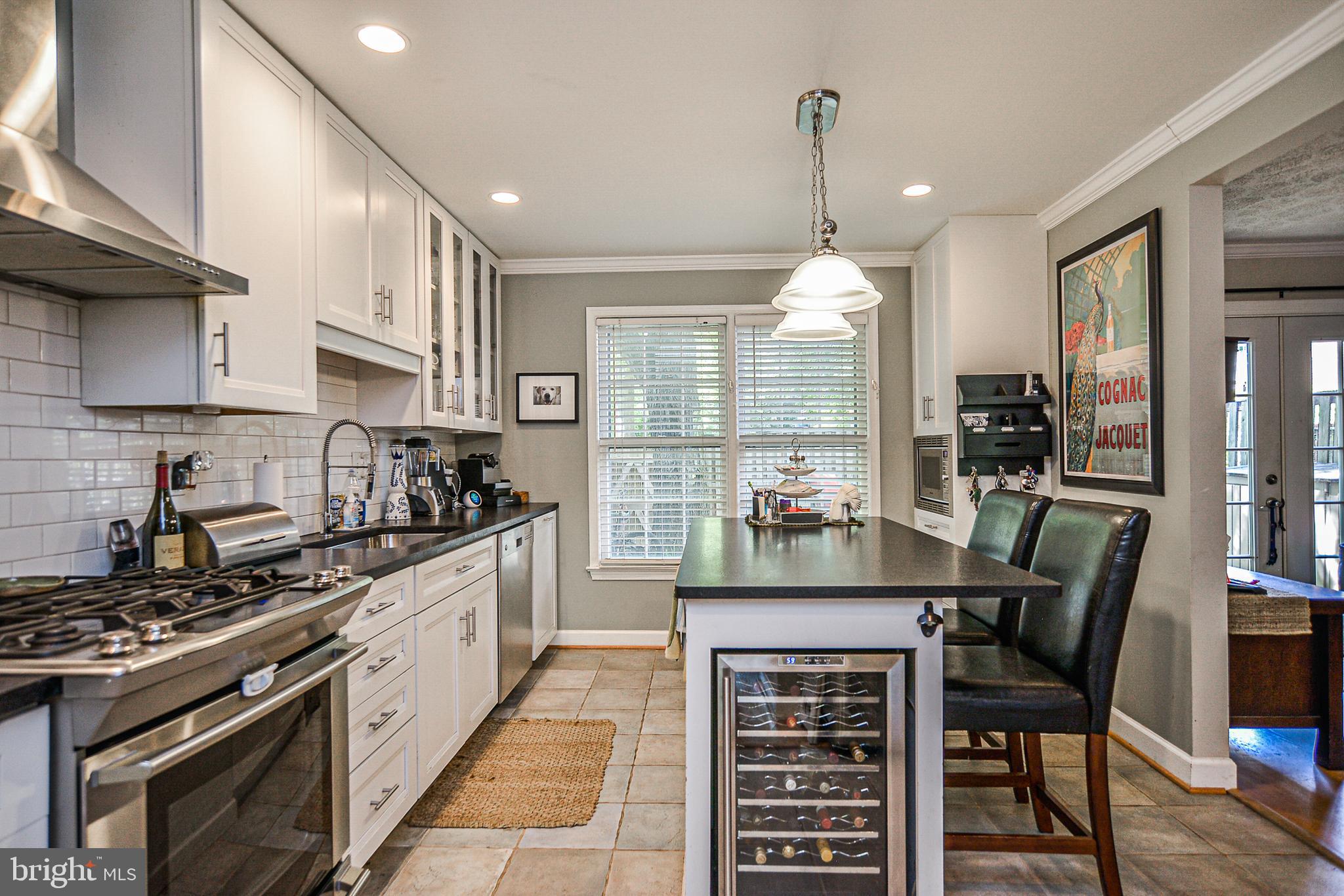 1834 Golf View Court Reston, VA 20190 - Photo 9 of 26 Ceiling height cabinets and wine fridge