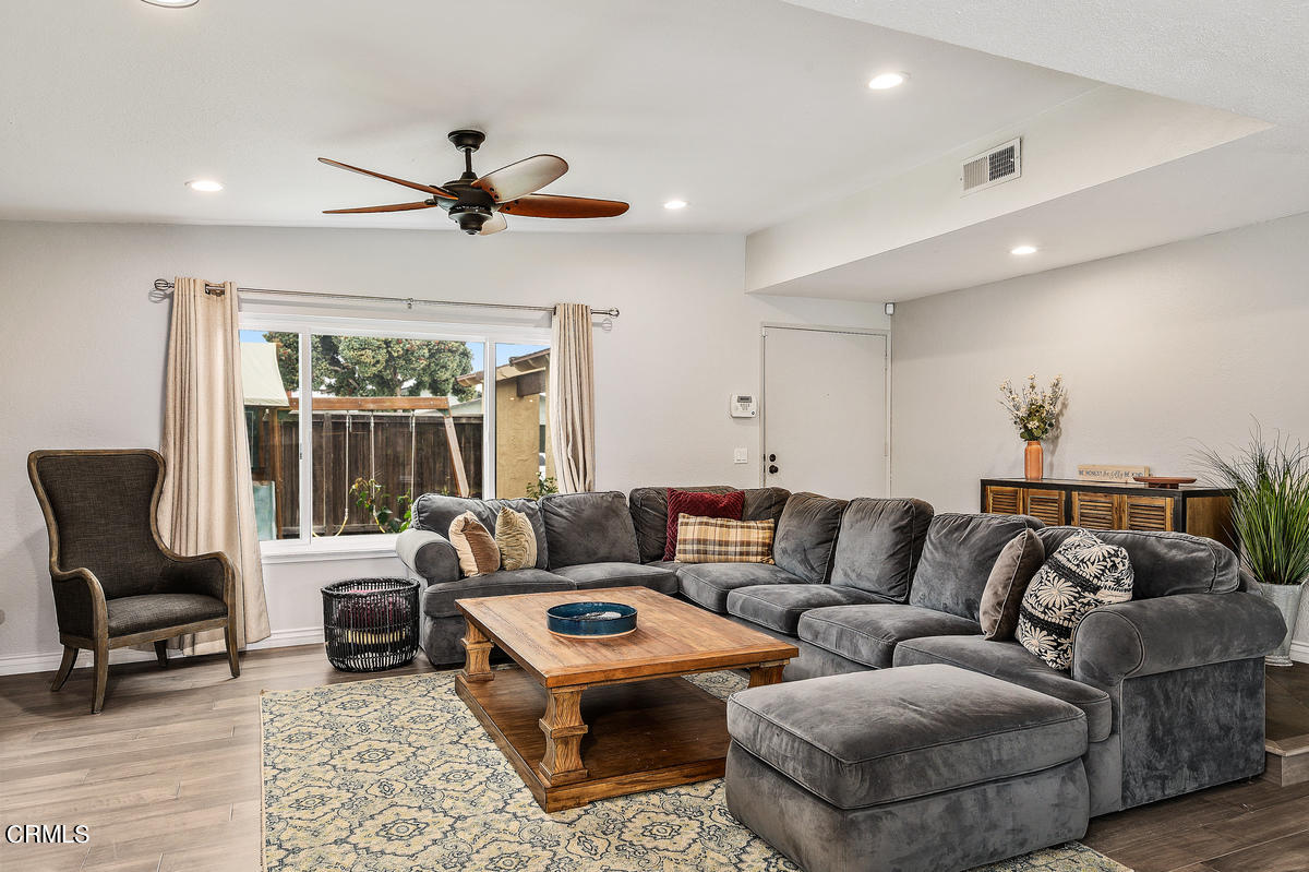 1540 Port Drive Oxnard, CA 93035 - Photo 11 of 39 a living room with furniture and a large window