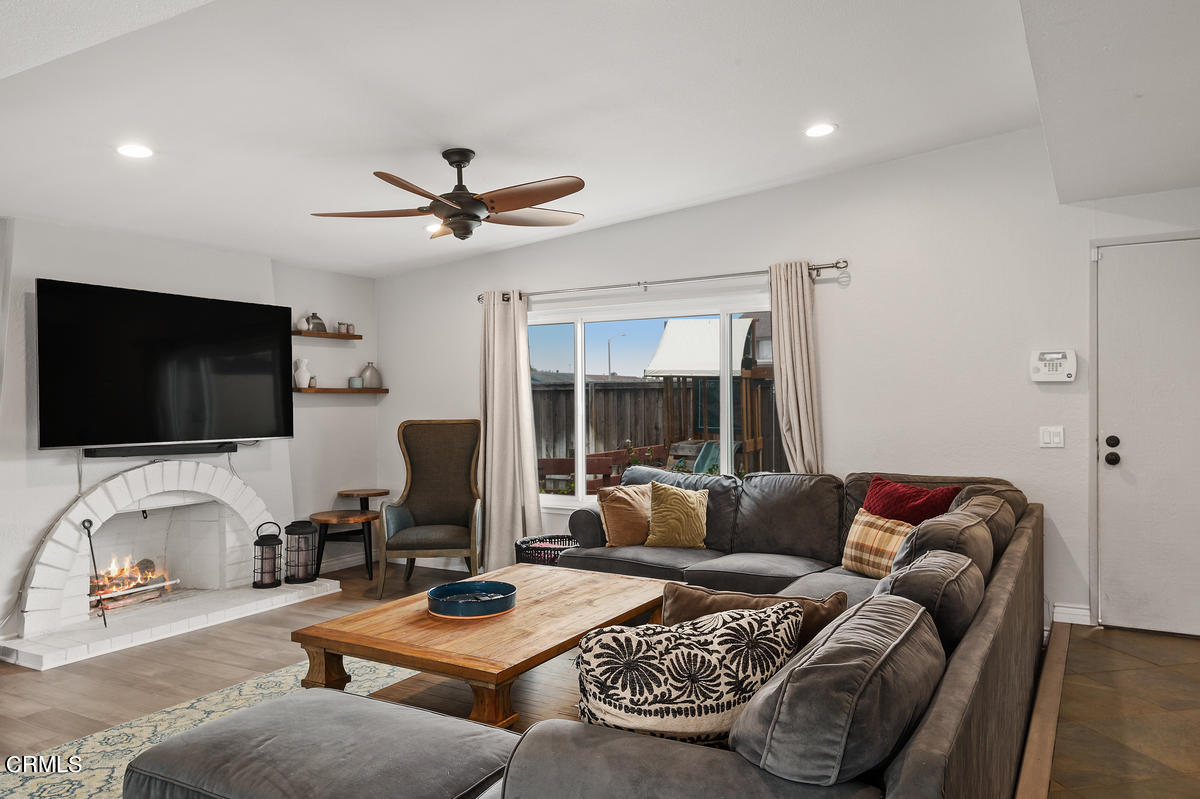 1540 Port Drive Oxnard, CA 93035 - Photo 12 of 39 a living room with furniture and a flat screen tv