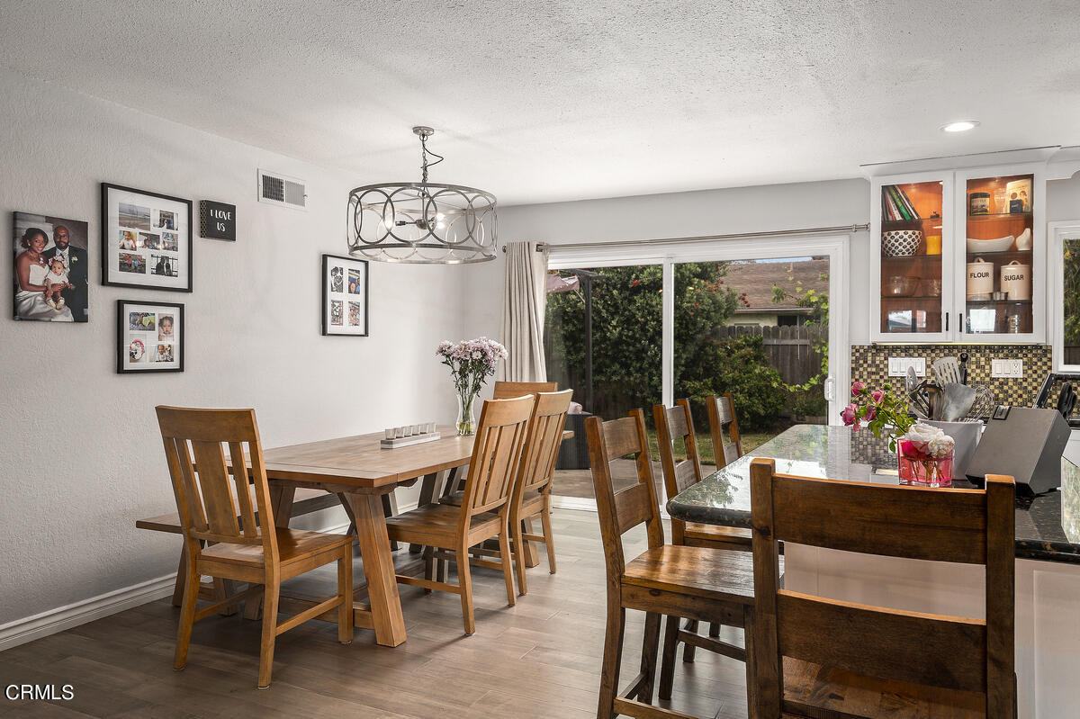 1540 Port Drive Oxnard, CA 93035 - Photo 18 of 39 a view of a dining room with furniture window and outside view