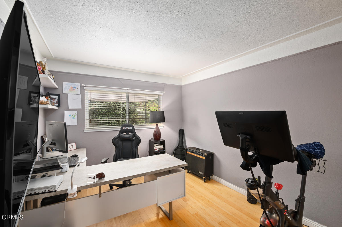 1540 Port Drive Oxnard, CA 93035 - Photo 28 of 39 a living room with furniture and a flat screen tv