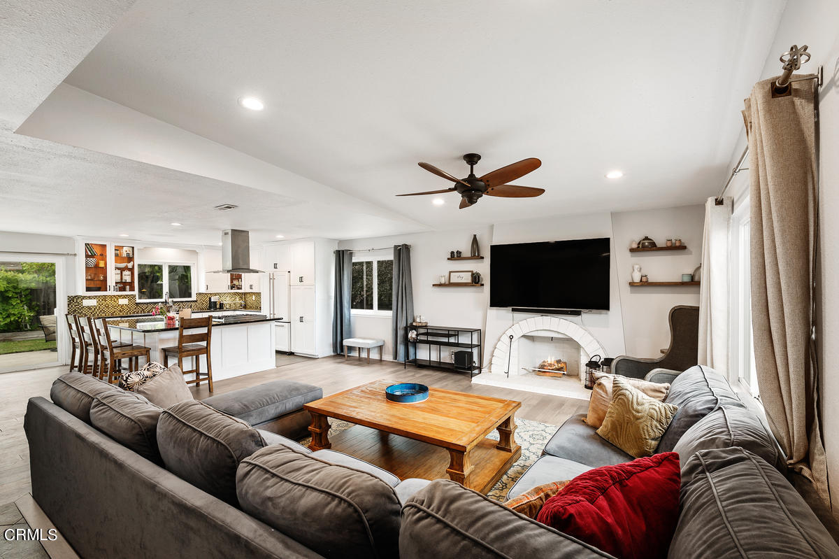 1540 Port Drive Oxnard, CA 93035 - Photo 7 of 39 a living room with furniture and a flat screen tv