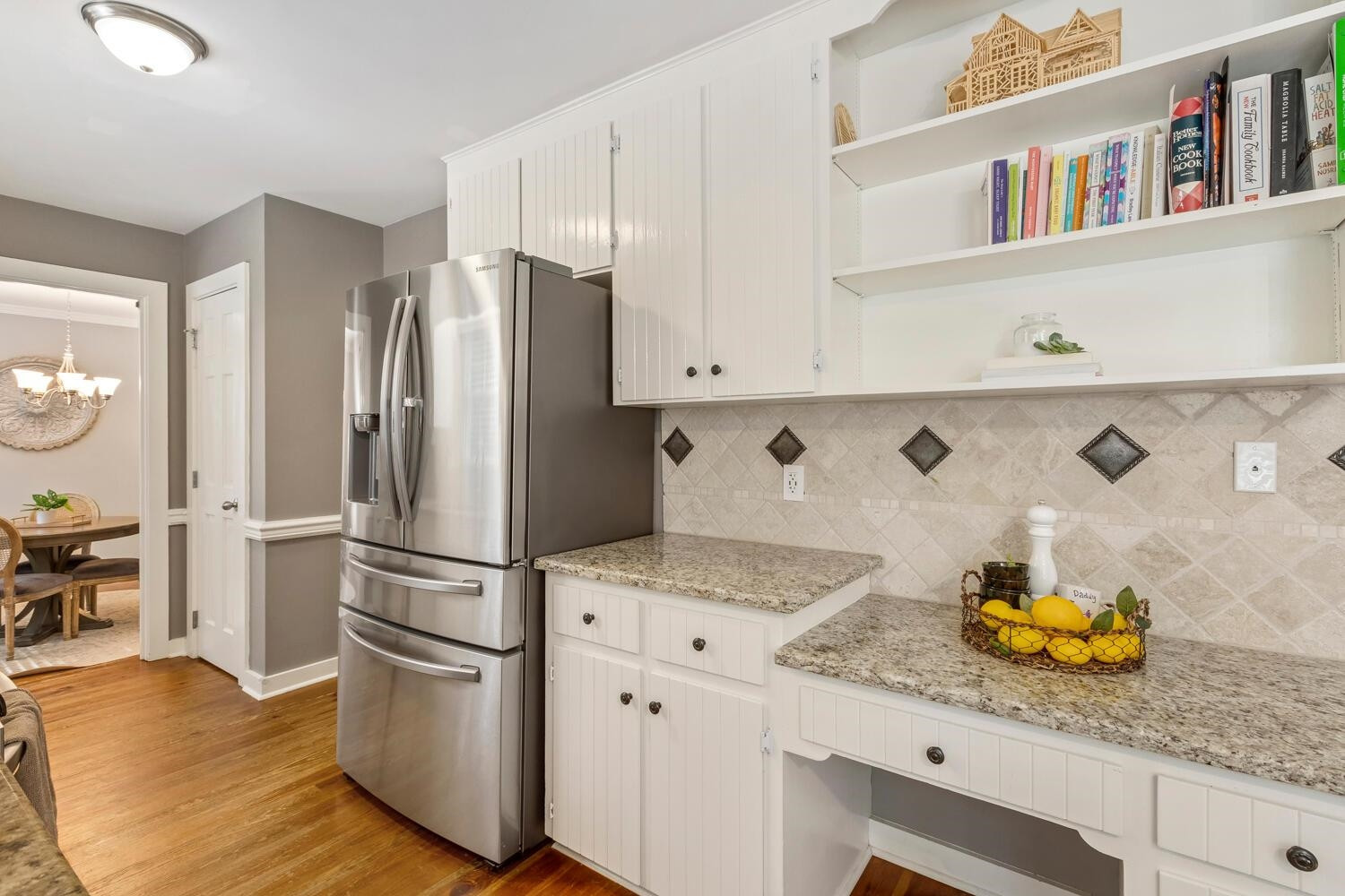 6600 Vancouver Lane Raleigh, NC 27615 - Photo 17 of 53 a kitchen with stainless steel appliances granite countertop a refrigerator sink and cabinets