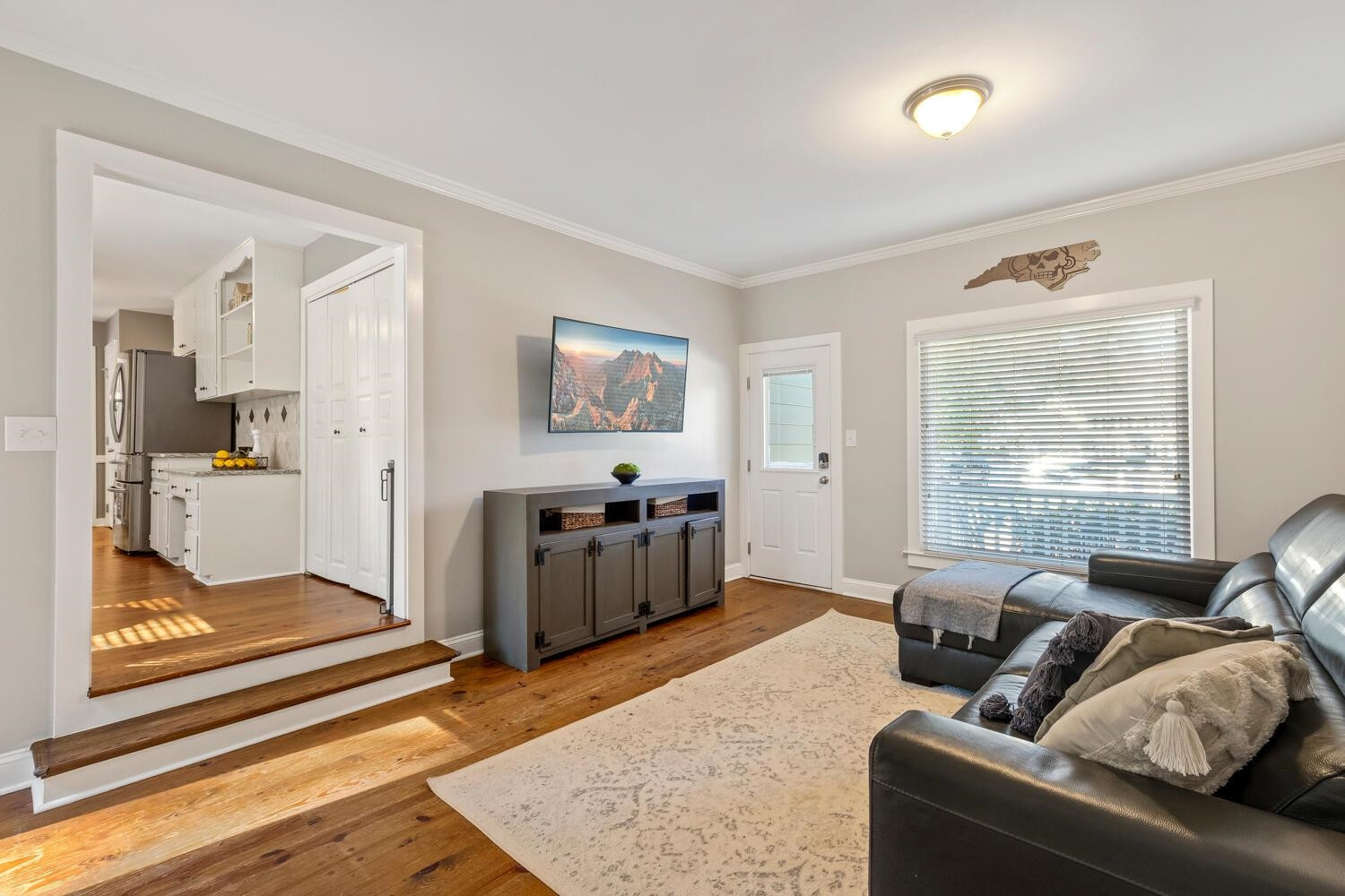 6600 Vancouver Lane Raleigh, NC 27615 - Photo 21 of 53 a living room with furniture and a window