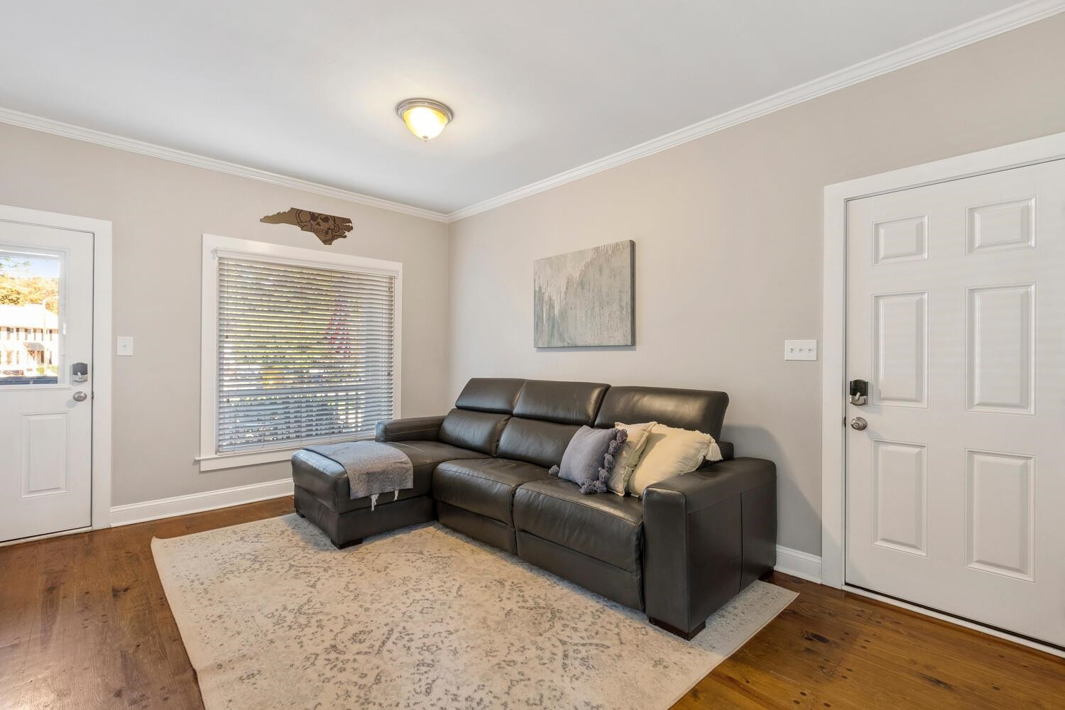 6600 Vancouver Lane Raleigh, NC 27615 - Photo 22 of 53 a living room with furniture and a window