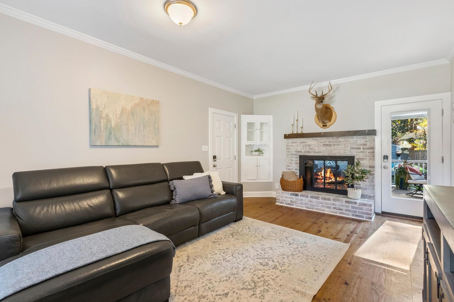 6600 Vancouver Lane Raleigh, NC 27615 - Photo 23 of 53 a living room with furniture and a fireplace